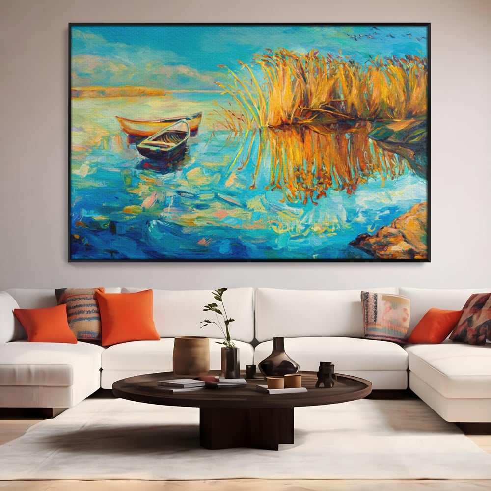 Tablou canvas peisaj cu barci pe lac, turcoaz si auriu, in rama de aluminiu negru, pe perete intr-un living